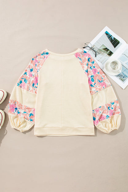 Aprikosenfarbene Bluse mit strukturiertem Patchwork und Ballonärmeln