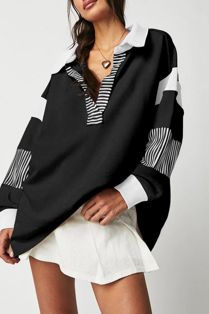 Schwarzes Sweatshirt mit gestreiftem Colorblock-Patchwork-Kragen