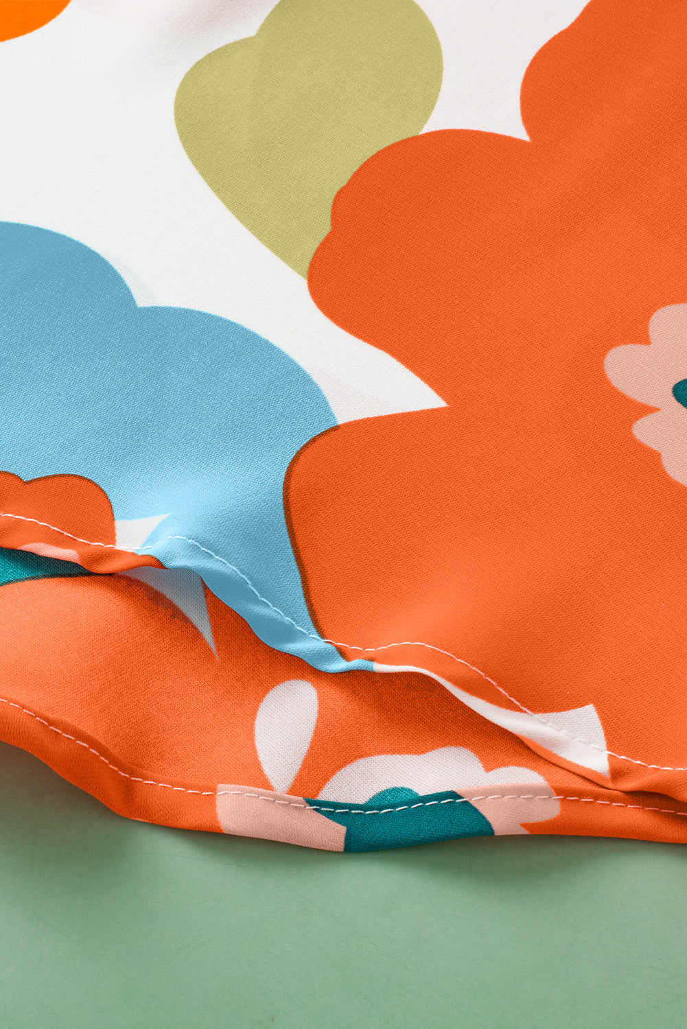 Orangefarbene Bluse mit Blumenmuster, V-Ausschnitt, Rüschenärmeln