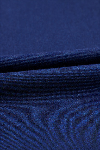 Dunkelblaue, einfarbige Schlagjeans mit gekreuzter High Waist