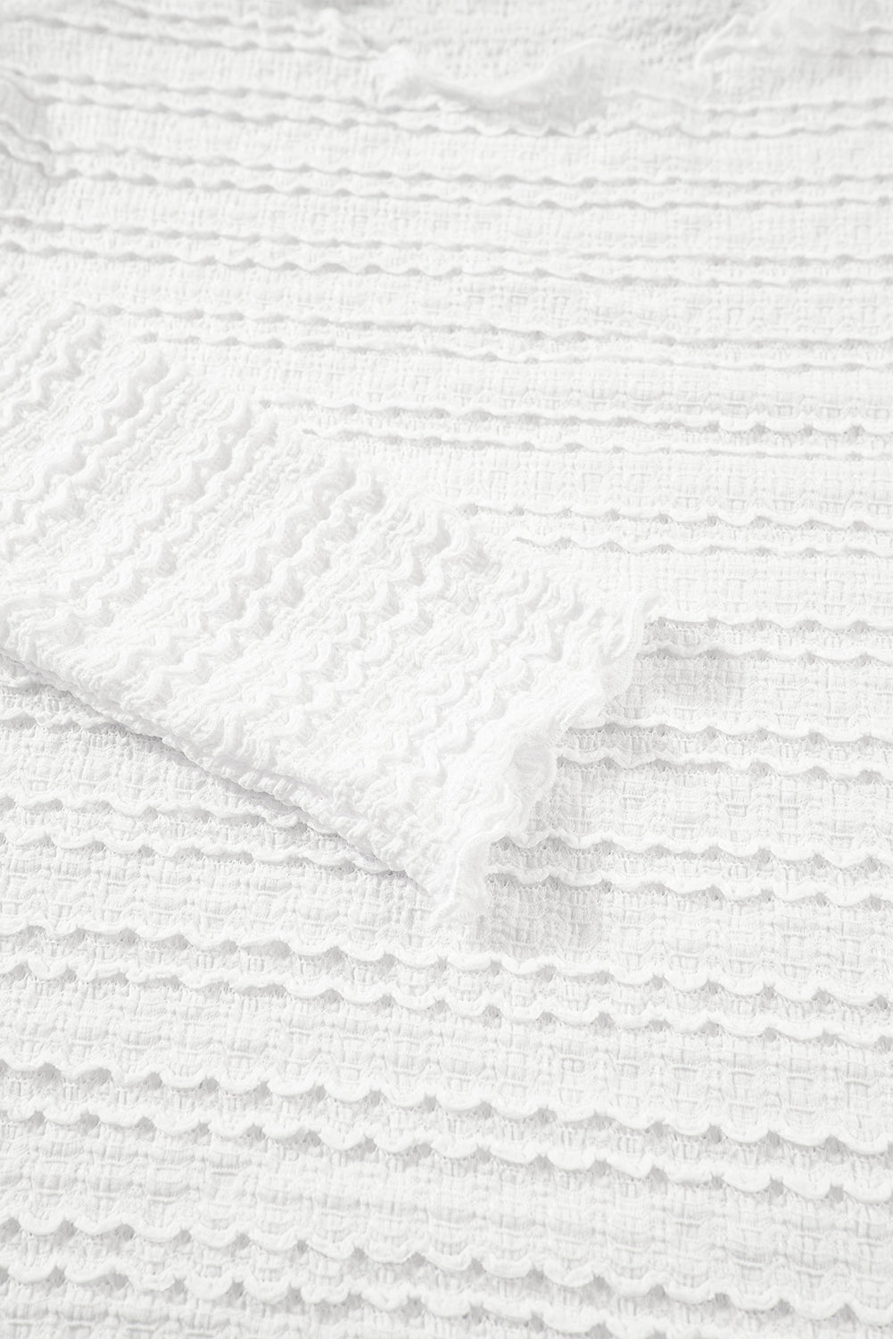 Weißes, schmal geschnittenes Jacquard-Strickoberteil
