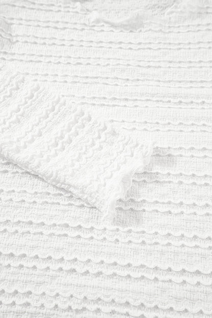 Weißes, schmal geschnittenes Jacquard-Strickoberteil