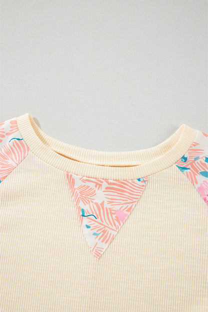 Aprikosenfarbene Bluse mit strukturiertem Patchwork und Ballonärmeln