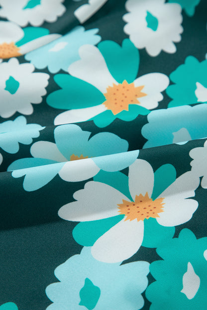Grünes, gestuftes Hemdkleid mit langen Puffärmeln und Blumenmuster