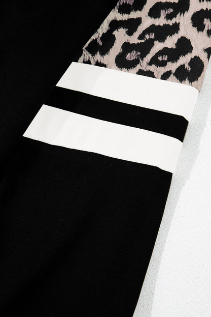 Schwarzes Sweatshirt mit Raglanärmeln und Farbblockdesign mit Leopardenmuster
