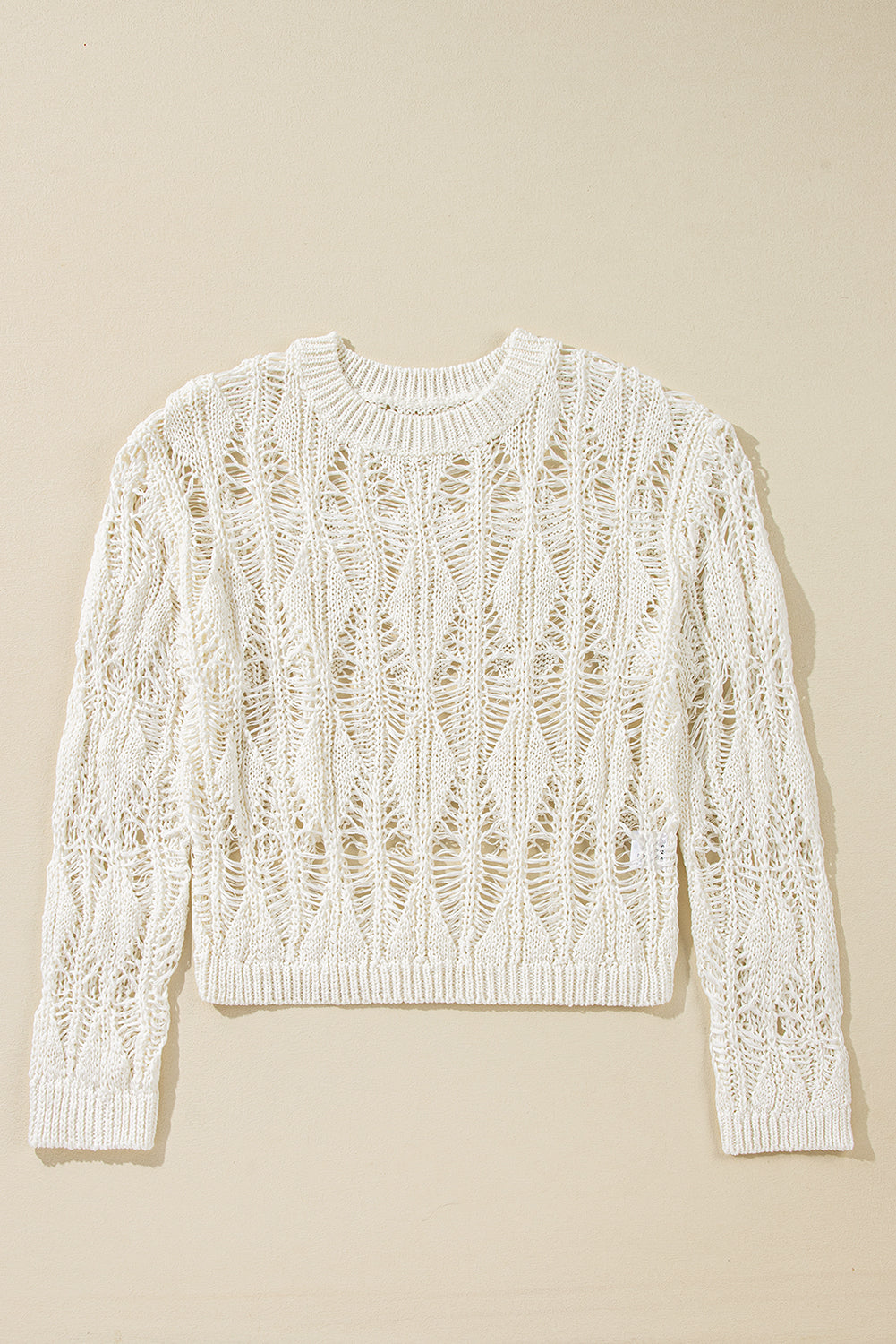 Weißer, locker sitzender Pullover mit Rundhalsausschnitt und Häkelmuster