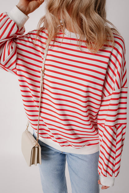 Orange gestreiftes, lockeres Sweatshirt mit überschnittener Schulter und Rundhalsausschnitt