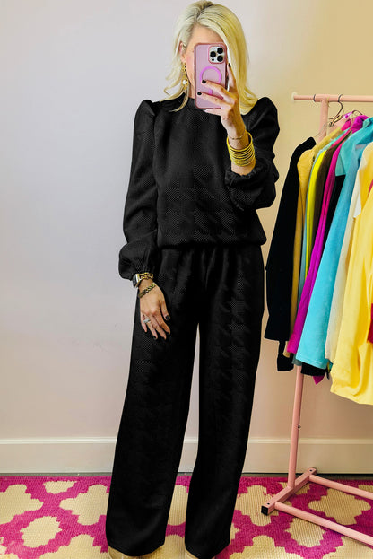 Schwarzes Set aus Oberteil und Hose mit Puffärmeln und Struktur