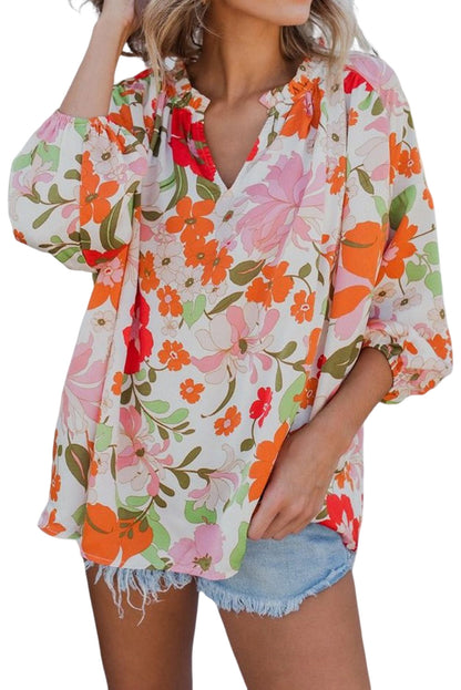 Orangefarbene Bluse mit Puffärmeln und Rüschenbesatz