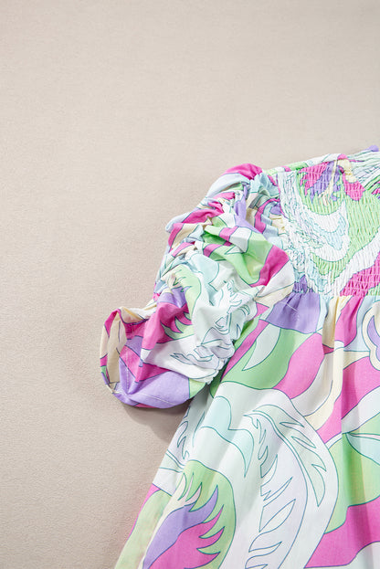 Grüne Bluse mit abstraktem Print und Puffärmeln