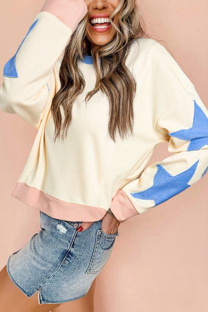 Beiges Oversize-Sweatshirt mit Stern-Patchwork und sichtbaren Nähten