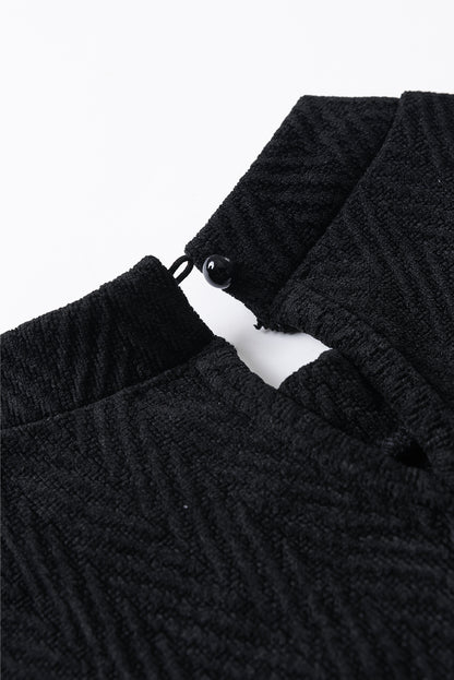 Schwarze Bluse mit Stehkragen und Puffärmeln
