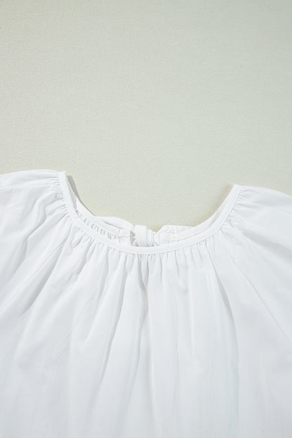 Weiße Bluse mit 3/4-Ärmeln und Schleife und Cut-Out auf der Rückseite