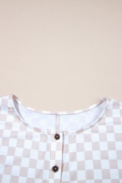 Aprikosenfarbener Jumpsuit mit weitem Bein und Karomuster, Rundhalsausschnitt und Knöpfen