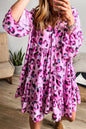 Kleid mit rosa Leopardenmuster, geknöpfter Vorderseite und 3/4-Ärmeln, gestuftem Rüschensaum