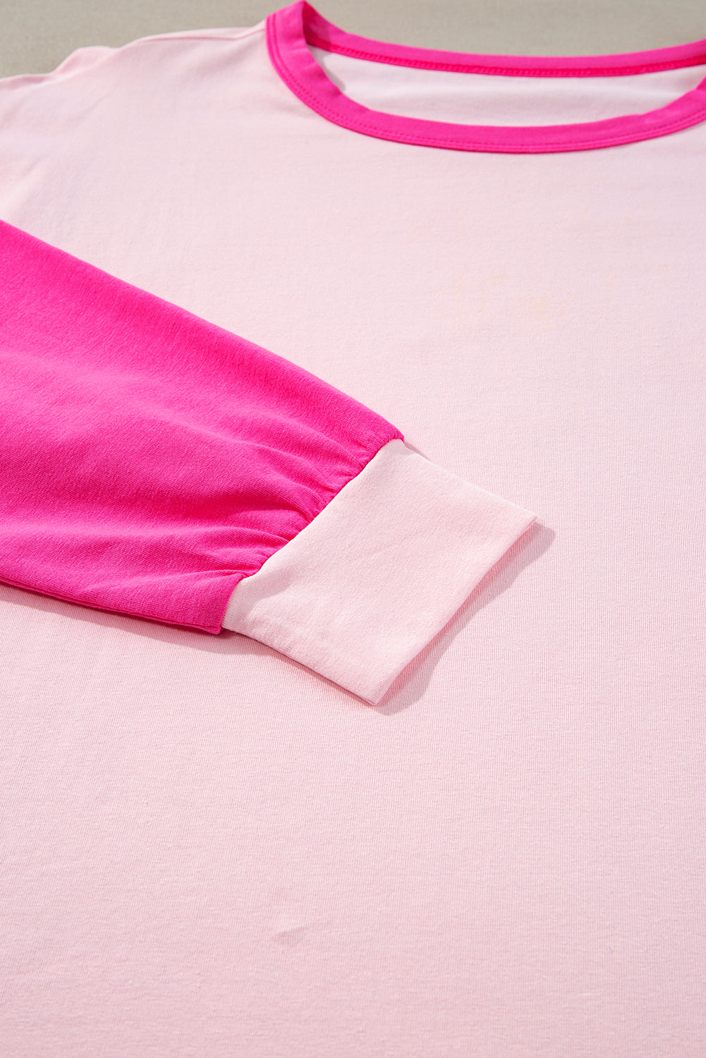 Rosa, lockeres Oberteil mit Farbblock-Patchwork und langen Ärmeln