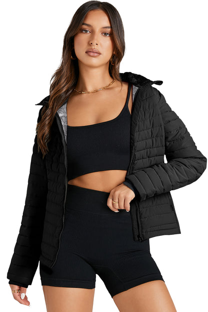 Schwarze, einfarbige Steppjacke mit Reißverschluss