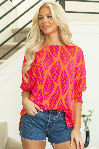 Rose – Bluse mit gesmokten Puffärmeln und tropischem Blattmuster