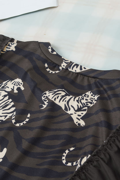 Schwarzes, stylisches Oberteil mit Rüschenärmeln und Animalprint