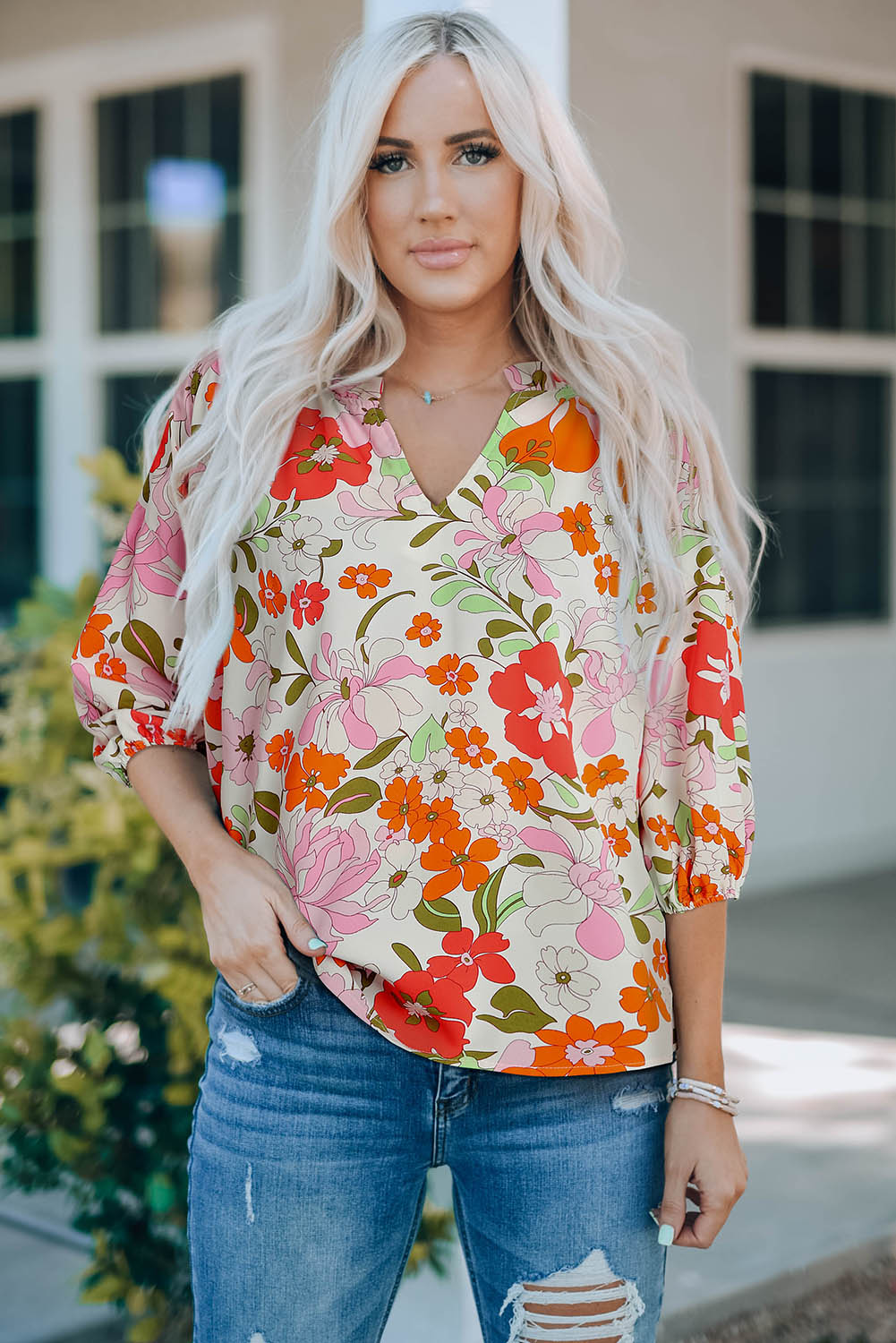 Orangefarbene Bluse mit Puffärmeln und Rüschenbesatz