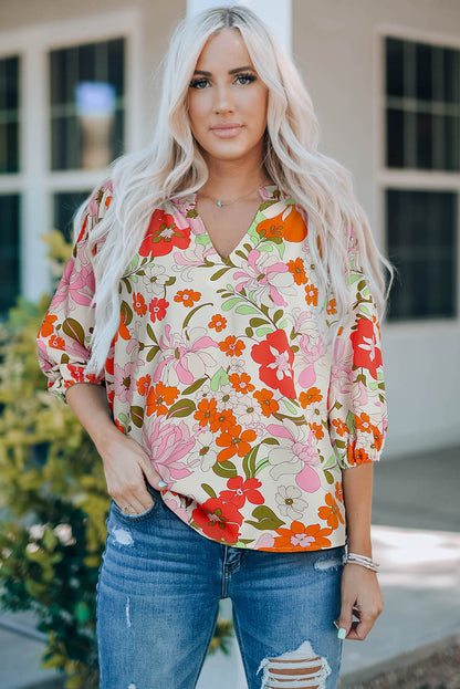 Orangefarbene Bluse mit Puffärmeln und Rüschenbesatz