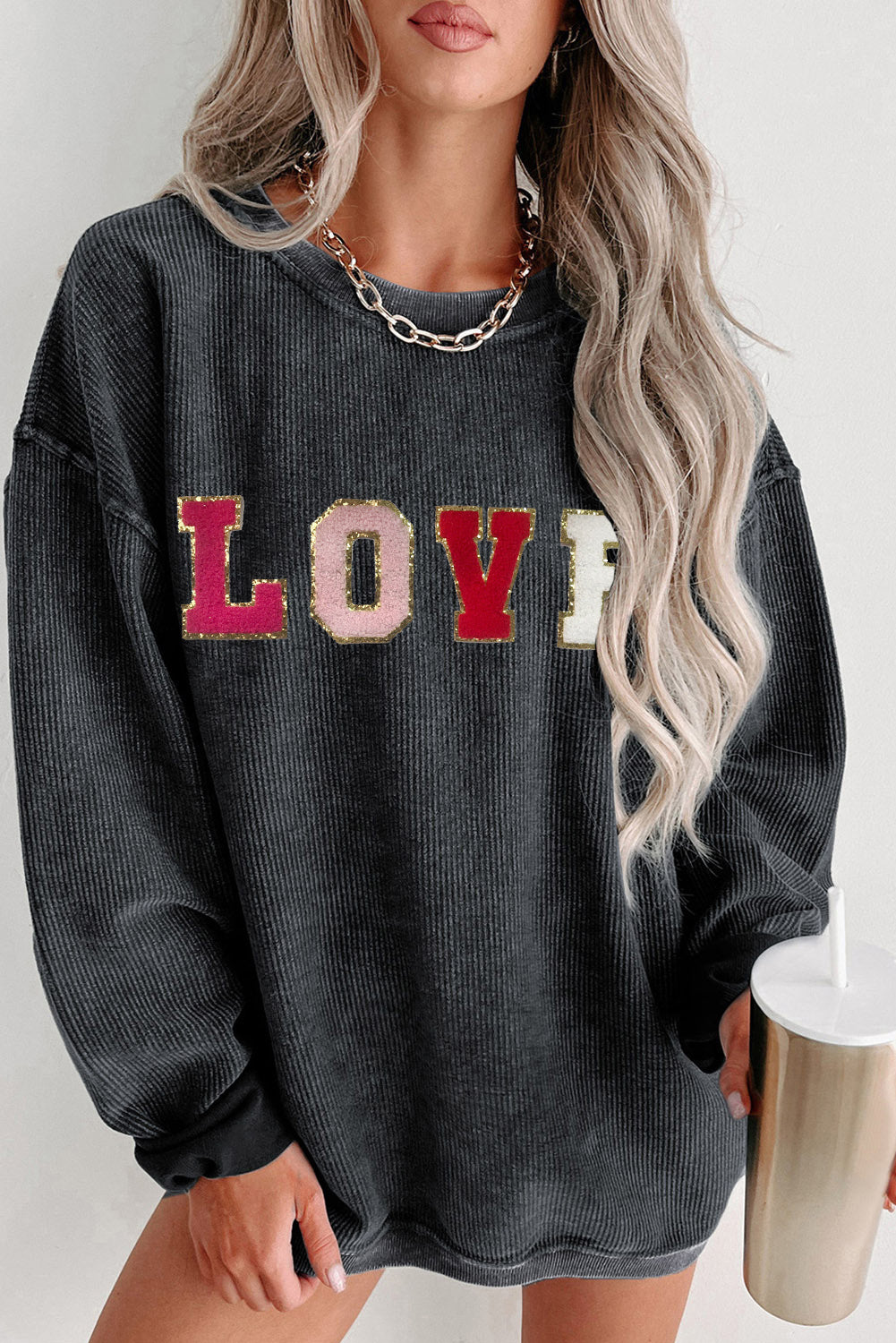 Schwarzes Sweatshirt mit Chenille-Stickerei und Grafik „LOVE“