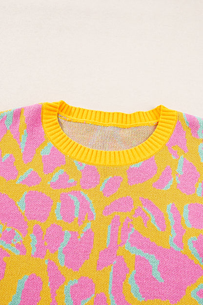 Vitality – Orangefarbener Baggy-Pullover mit abstraktem Print und geripptem Saum