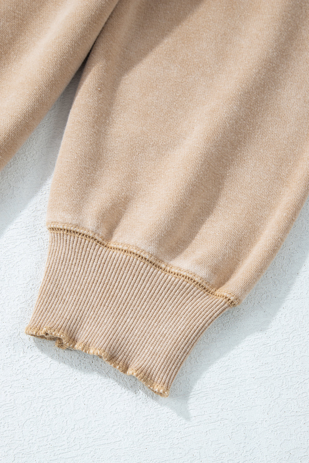 Helles, französisches Beige, einfarbiges Waffelstrick-Patchwork-Sweatshirt mit Raglanärmeln