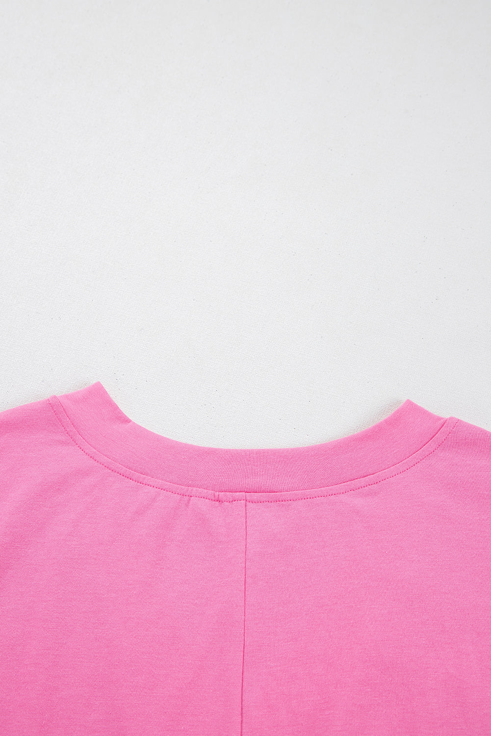 Bonbon – Lockerer Strick-Strampler mit halblangen Ärmeln und V-Ausschnitt