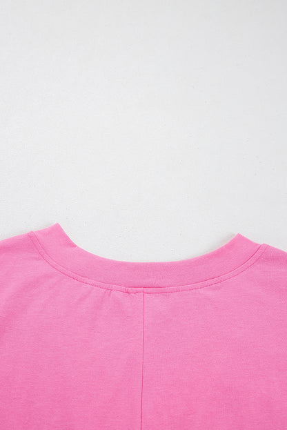 Bonbon – Lockerer Strick-Strampler mit halblangen Ärmeln und V-Ausschnitt