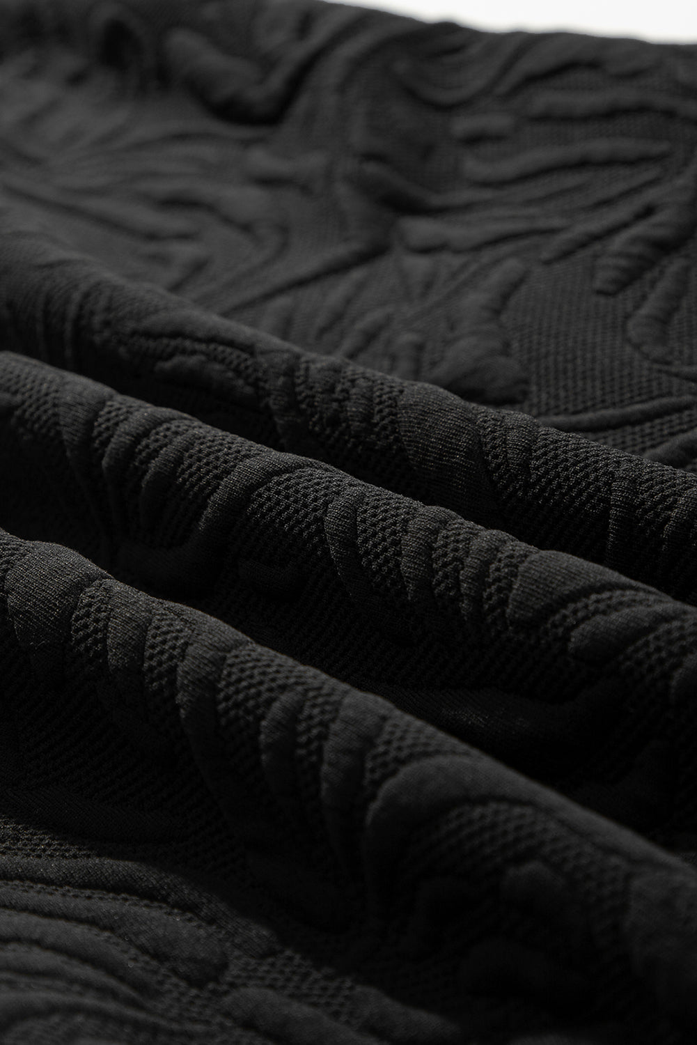Schwarzes, strukturiertes Jacquard-Minikleid mit Viertelreißverschluss
