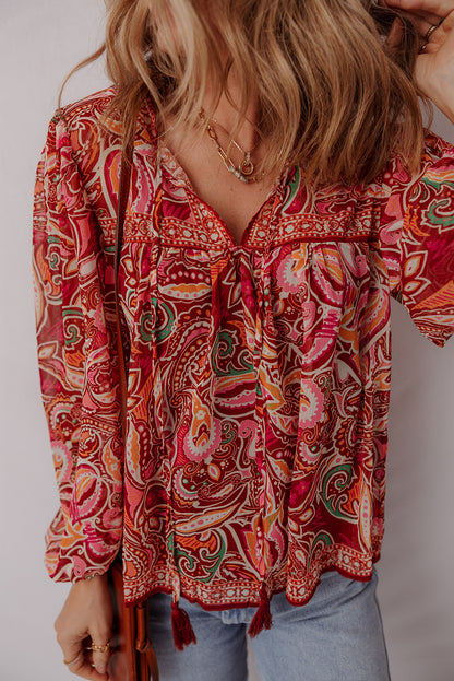 Mehrfarbige Boho-Bluse mit ethnischem Paisley-Print, Quaste und Puffärmeln