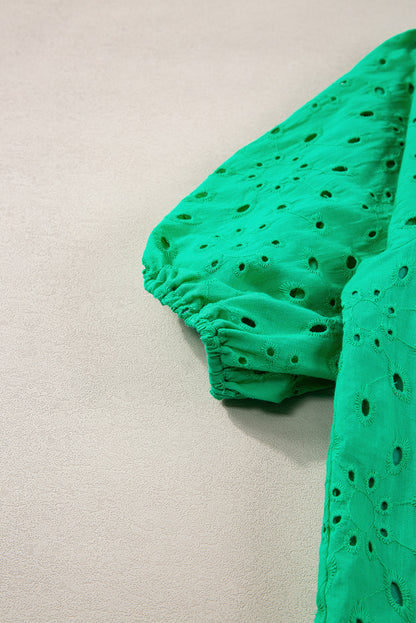 Grüne Bluse mit Blumenstickerei und Puffärmeln
