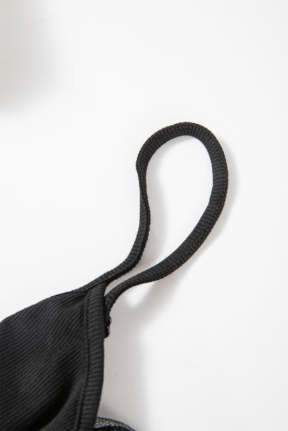 Schwarze, schmal geschnittene Langarmbluse mit Häkel-Spleißen und Spitzennetz