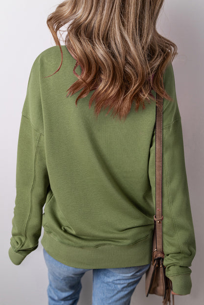 Vineyard Green – Lockeres Sweatshirt mit überschnittenen Schultern und überkreuzten Nähten