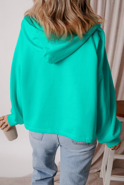 Aruba Blauer, lockerer Hoodie mit Fleecefutter und Kängurutaschen mit halbem Reißverschluss