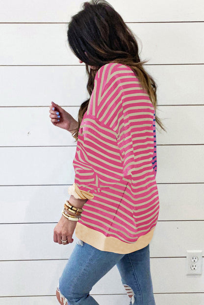 Rosa gestreiftes, lässiges, gestreiftes Colorblock-Sweatshirt mit überschnittener Schulter