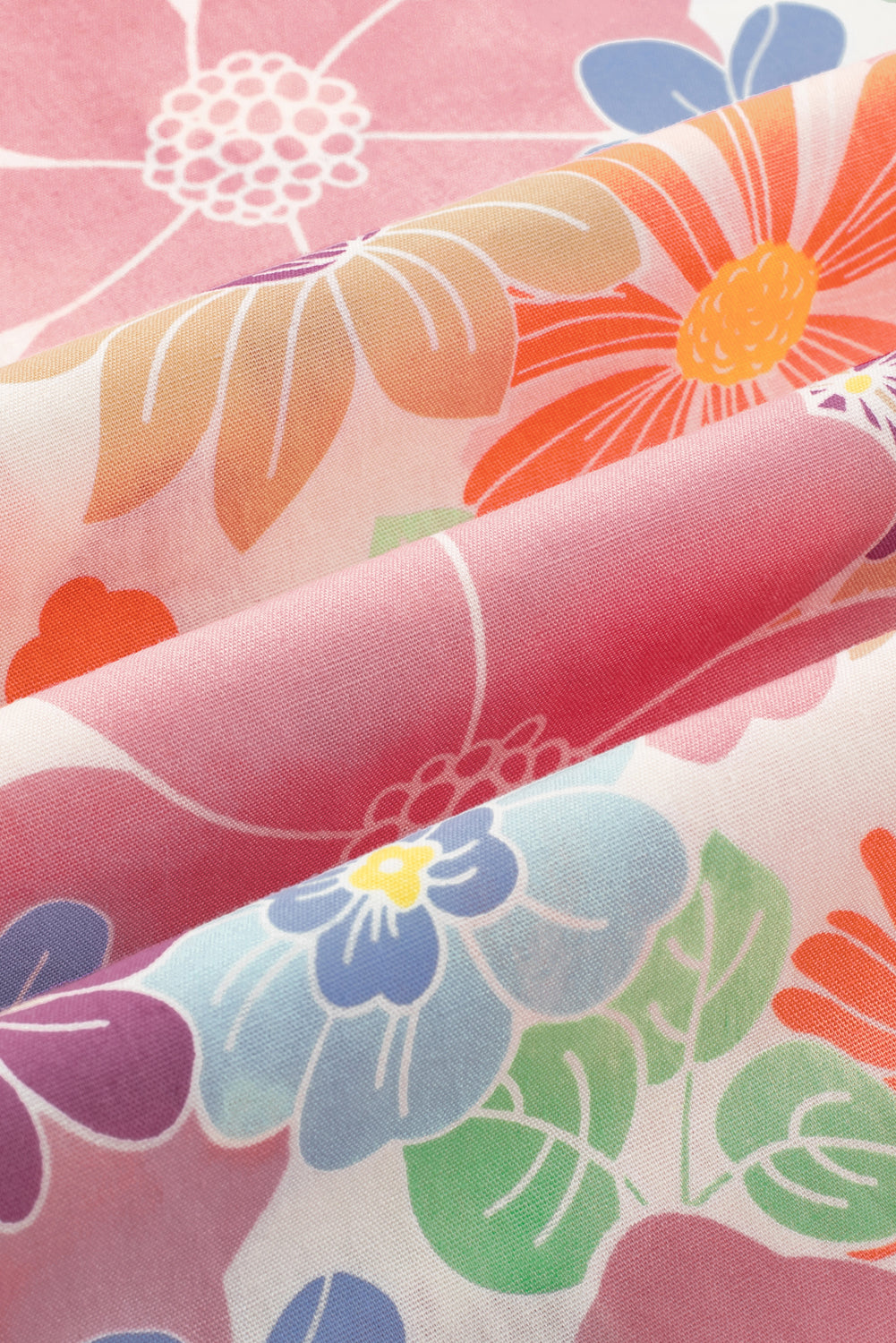 Rosafarbene, lockere Hose mit gesmoktem Bund und Blumenmuster