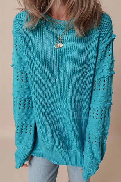 Türkisfarbener Pullover mit gerüschten Ösenärmeln