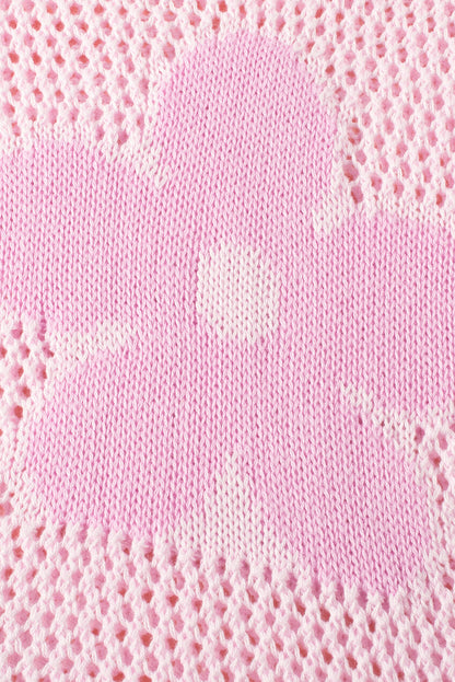 Hellrosa Strickpullover mit großer Blume und tief angesetzter Schulterpartie