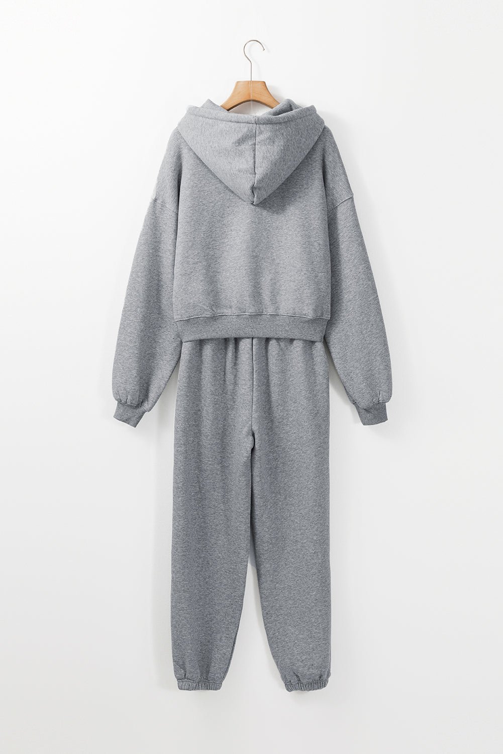 Graues Activewear-Set mit Kapuzenpullover und Jogginghose mit überschnittenen Schultern