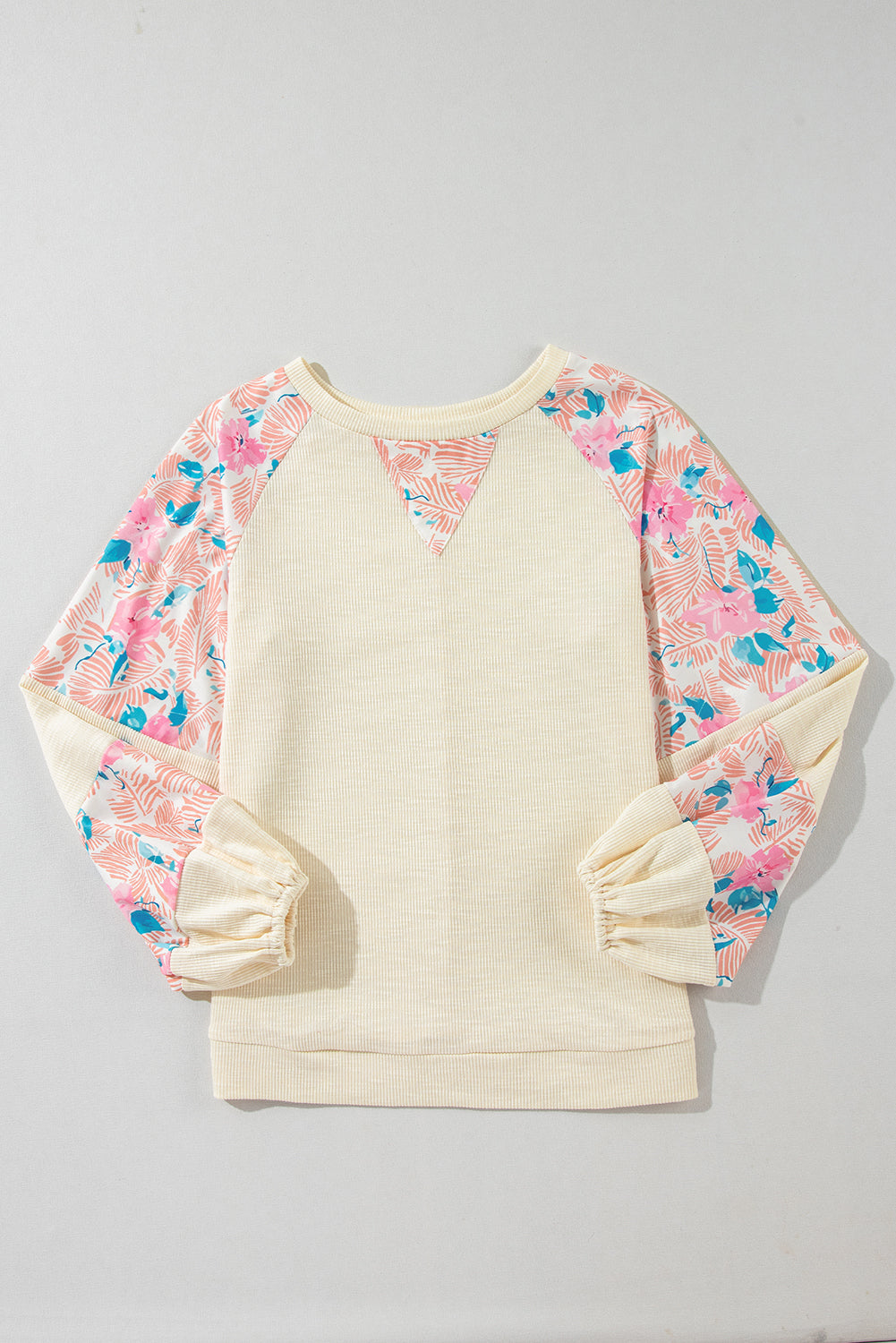 Aprikosenfarbene Bluse mit strukturiertem Patchwork und Ballonärmeln