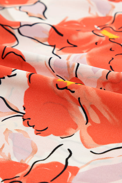 Orangefarbene Bluse mit Blumenmuster, Puffärmeln und Rüschenkragen