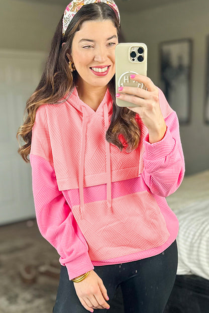 Rosafarbener Hoodie mit strukturiertem Farbblockdesign und Kängurutasche und überschnittener Schulter
