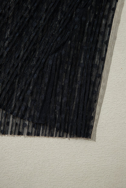 Schwarze Bluse mit transparenter Spitze und Stehkragen und langen Ärmeln