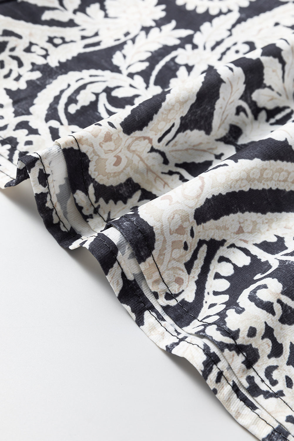 Schwarze Hose mit weitem Bein und Bohemien-Print