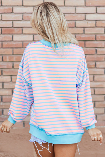 Rosa gestreiftes High-Low-Pullover-Tunika-Sweatshirt mit Kontrastbesatz