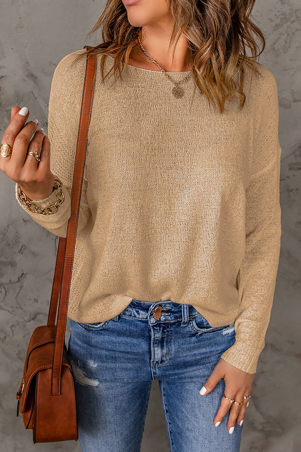 Aprikosenfarbener Pullover mit überschnittener Schulter