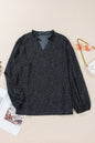 Schwarze Bluse mit V-Ausschnitt und Leopardenmuster in Übergröße