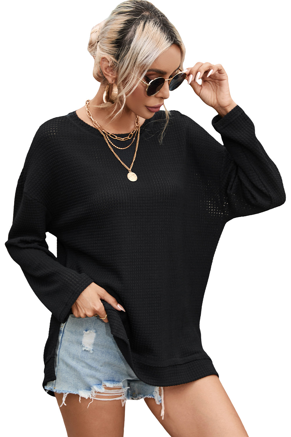 Schwarzes Oversize-Oberteil mit hohen Schlitzen und Waffelstrick